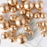 Golden faux balls ballons for cake decoration pack of 20